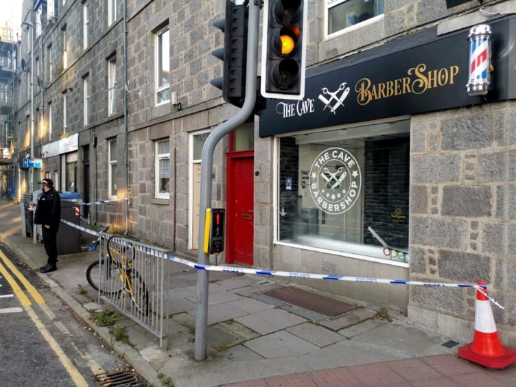 Police cordon on Menzies Road in Torry, Aberdeen, after reports of an assault.