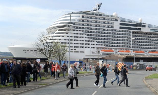 Cruise ship tourists arrive in Invergordon. Image: Sandy McCook.