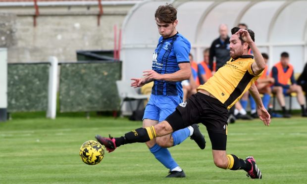 Callum Maclean, right, in action for Nairn County is hoping to reach the North of Scotland Cup final.