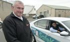 Owner of Inverness Taxis, Gavin Johnston with taxi driver Mohammed Naveed. Image: Sandy McCook/DC Thomson