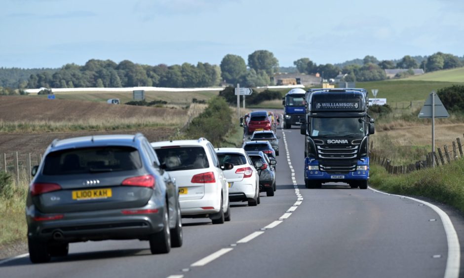 Traffic travelling on the A96 Inverness and Aberdeen road. A96 crash Nairn