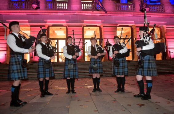 Renfrewshire School Pipe Band play outside Paisley Abbey and Town Hall. Image: Sandy McCook/DC Thomson