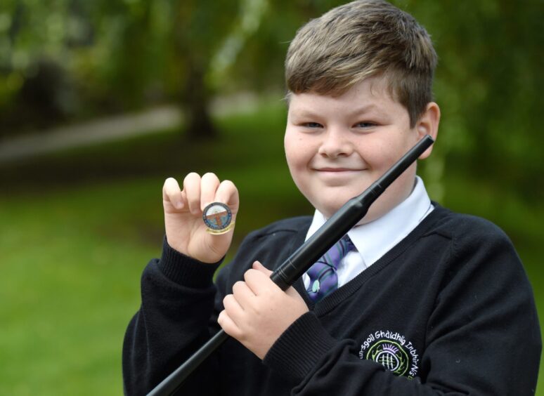 Alasdair MacLeod of Inverness Gaelic School who is the winner in the 2/4 March under 13 competition on day one of the Royal National Mod.