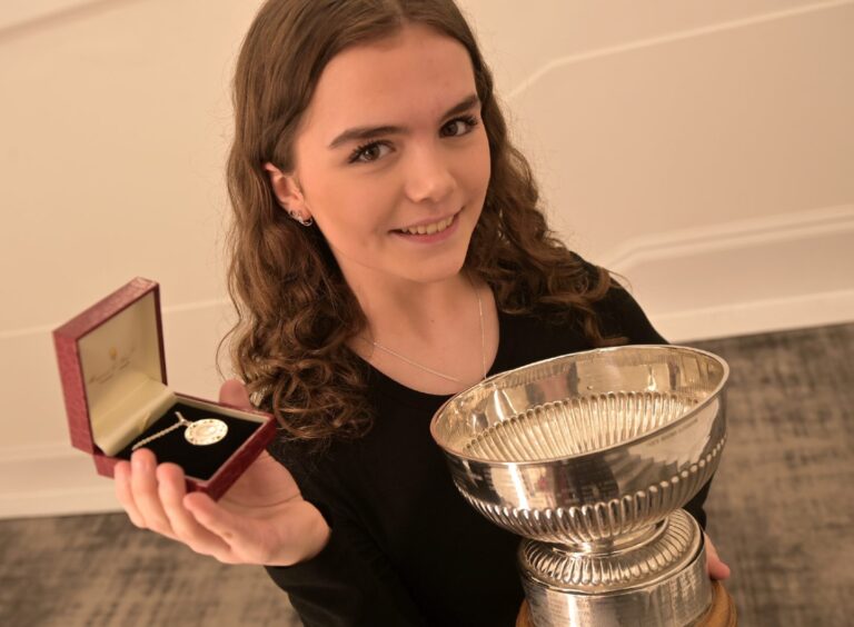 Aimee MacLeod of the Nicholson Institute, Stornoway with the James C. MacPhee Memorial Medal and the Alexander Hamilton Trophy