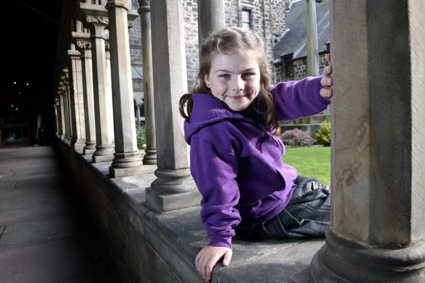 Emily Wood of Mull Junior Mod Club photographed at Paisley Abbey after her win for poetry recitation. 