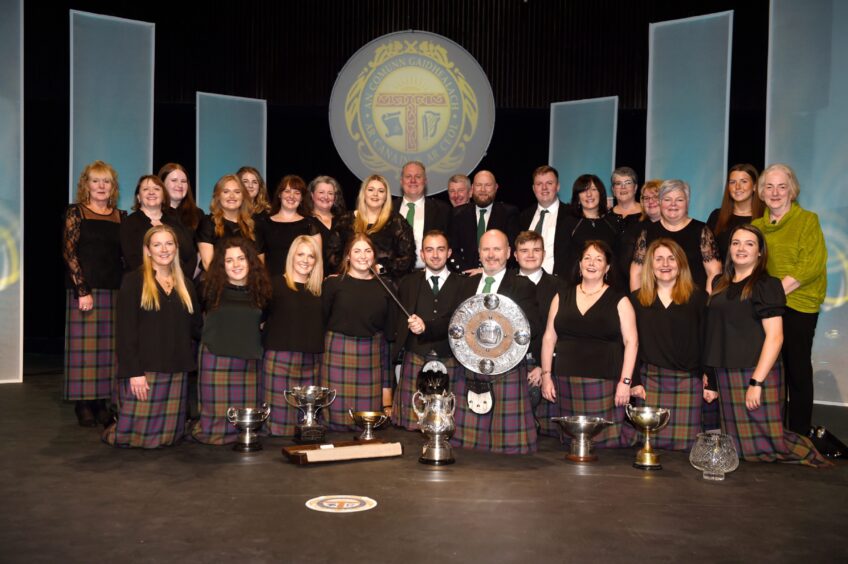 Lochs Gaelic Choir from Lewis with their conductor Ronnie Murray who won the Lorn Shield among an array of trophies this afternoon in Paisley.