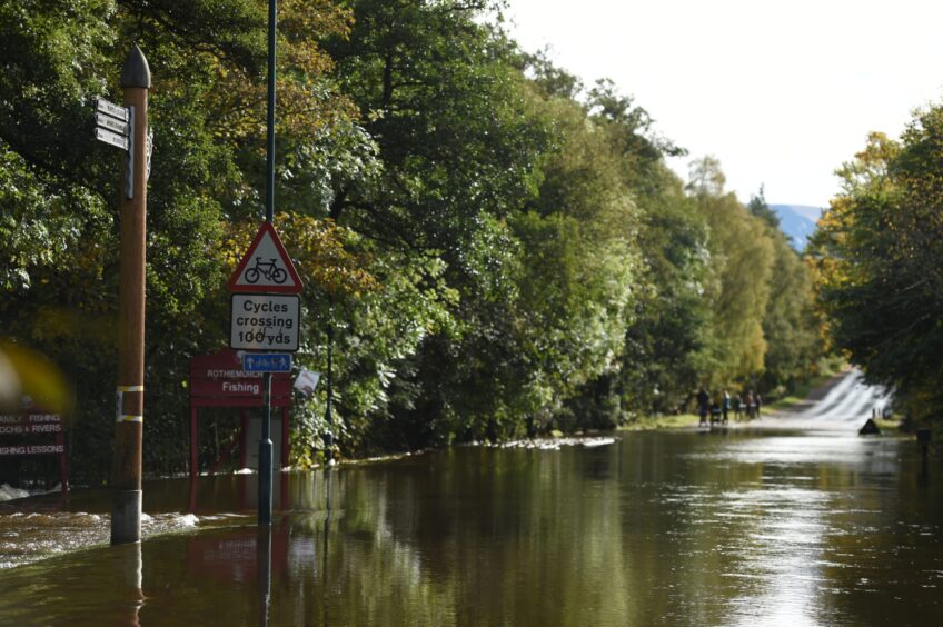 Water levels have reached as high as the trees in Aviemore following torrential rain.