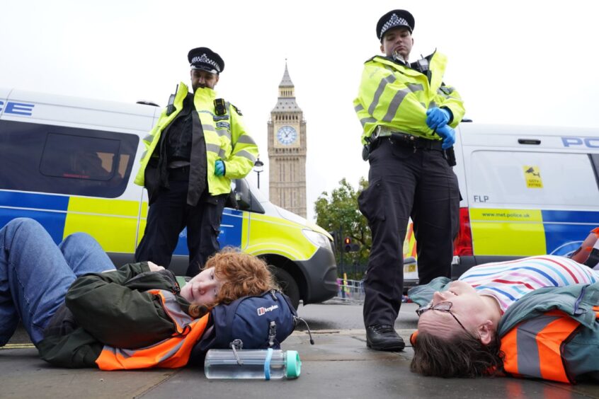 Just Stop Oil activists demonstrate in London to demand the UK Government immediately halts all new oil, gas and coal projects. 