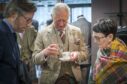 The King likes to visit farmers' markets and try regional produce.