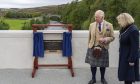 King Charles standing next to the plaque and Aberdeenshire Provost Judy Whyte.
