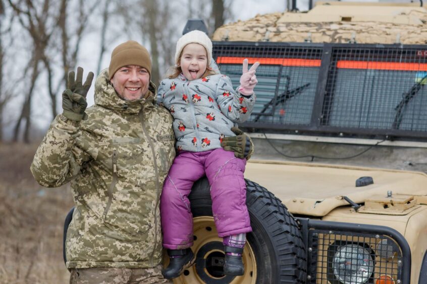 Svitlana's brother Serhii and five-year-old daughter. 