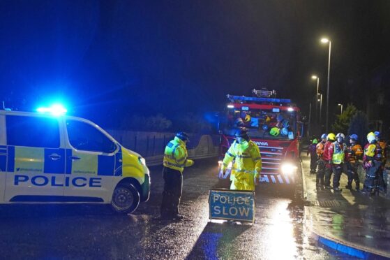 Police closed River Street in Brechin last night due to rising floodwater. Image: Andrew Milligan/PA Wire