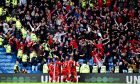 Aberdeen fans celebrating Jack MacKenzie's goal against Rangers