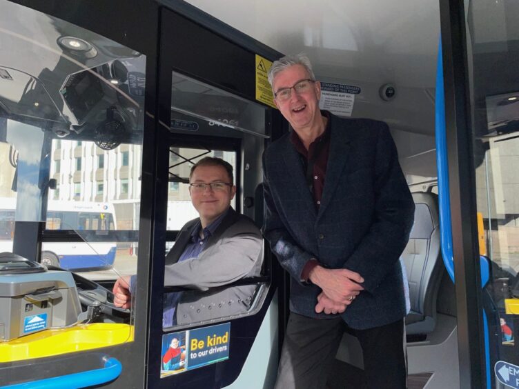 Innes Walker, city centre manager at Aberdeen Inspired, and Daniel Laird, commercial director at Stagecoach North Scotland on an Aberdeen bus