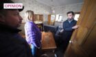 First Minister Humza Yousaf with Kim Clark and Paul Fowlie as they show him the mess inside their home following the floods in Brechin (Image: Andrew Milligan/PA Wire)