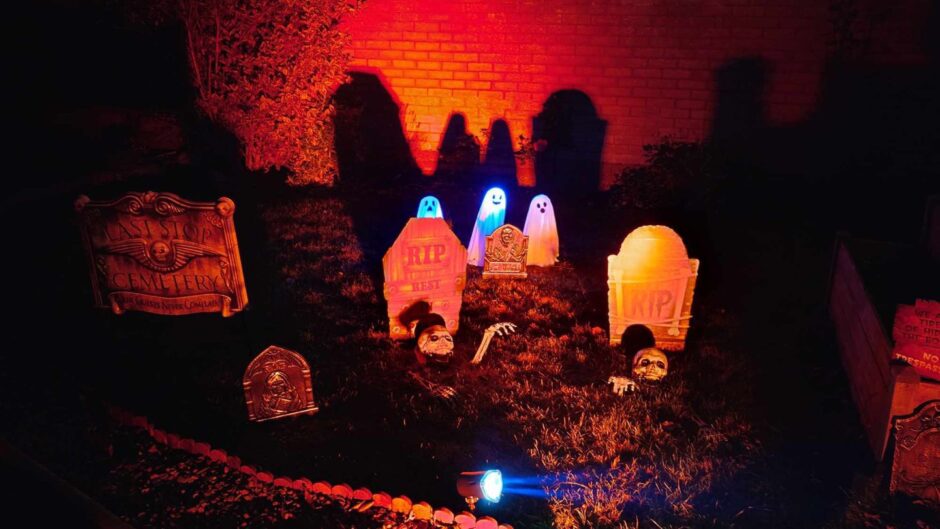 Ghost graves as part of Anita Stringman October 31st decor.