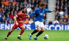 Aberdeen's Graeme Shinnie and Rangers' Sam Lammers in the Dons' 3-1 win at Ibrox. Image: SNS.