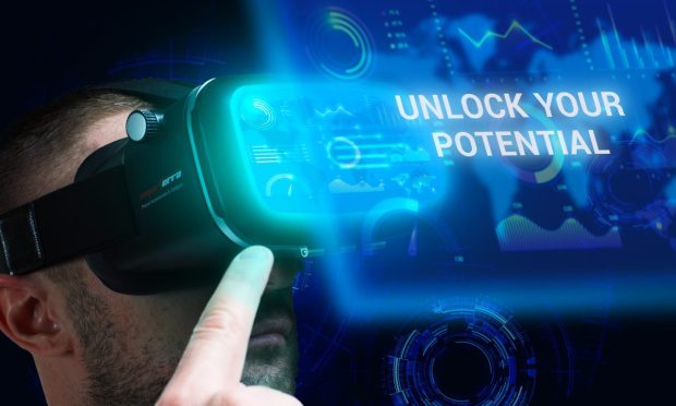 Business, Technology, Internet and network concept. Young businessman working on a virtual screen of the future and sees the inscription: Unlock your potential; Shutterstock ID 2130192497; purchase_order: ; job: