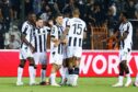 PAOK's players celebrate scoring the opening goal in their Europa Conference League win over Eintracht Frankfurt. Image: Shutterstock.