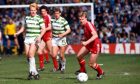 Aberdeen legend Frank McDougall in action against Celtic in the 1984-85 season. Image: Shutterstock