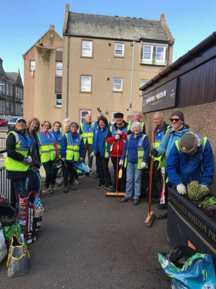 The group of volunteers from Stonehaven Horizons who planted the flowers only days before. 