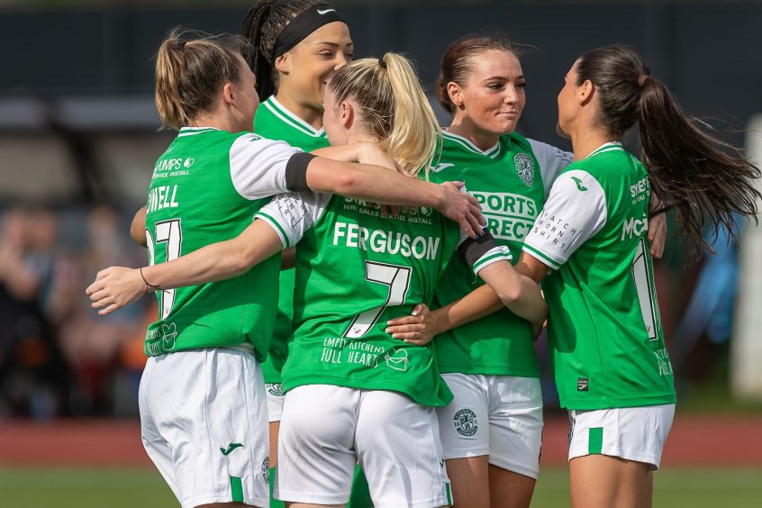 Hibernian celebrate scoring in their Sky Sports Cup match with Aberdeen Women