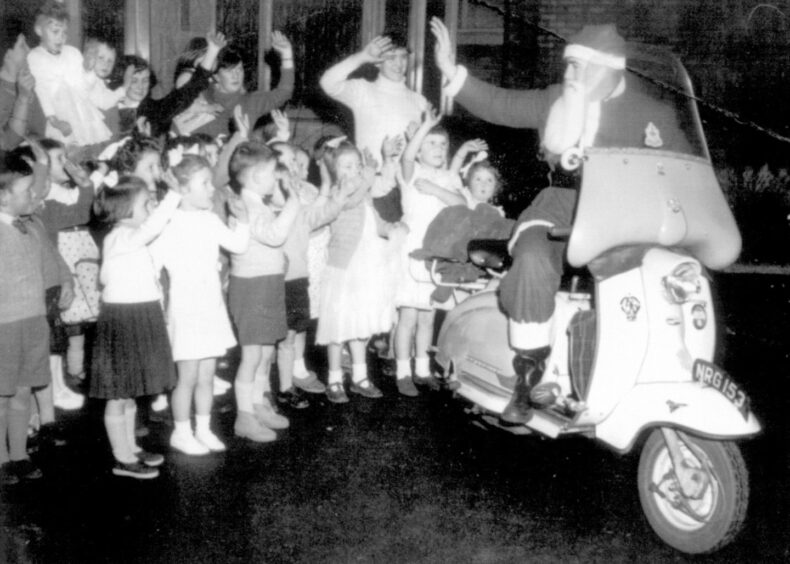 Santa visiting Springhill School in Mastrick, Aberdeen at Christmas in 1959.