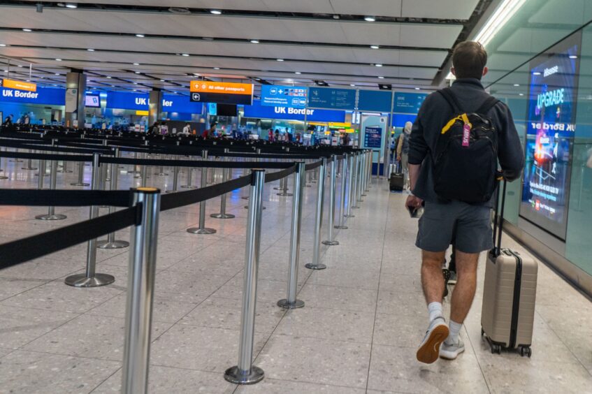 Pictured is a check-in desk at Heathrow Airport.