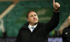 Malky Mackay acknowledges Ross County's fans at Easter Road. Image: Shutterstock.