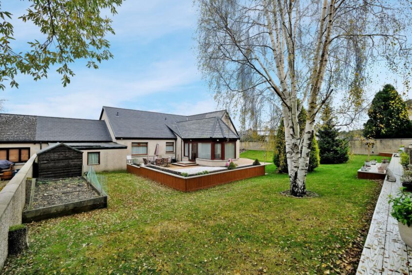 Large back garden of the Inverurie bungalow for sale.