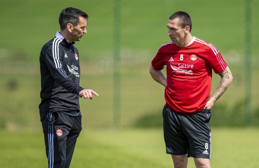 Then Aberdeen manager Stephen Glass and Scott Brown during a training session at Cormack Park.