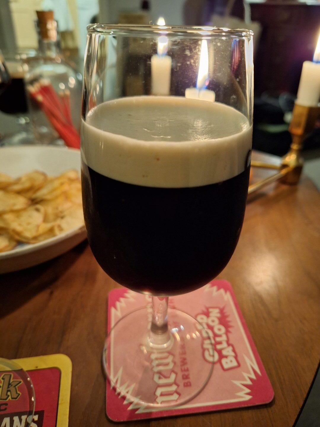 A glass full of regular canned Guinness. 