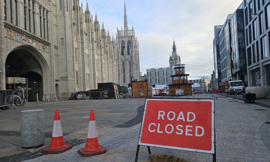 Road closed sign in Aberdeen city centre in preparation for the Christmas Village.