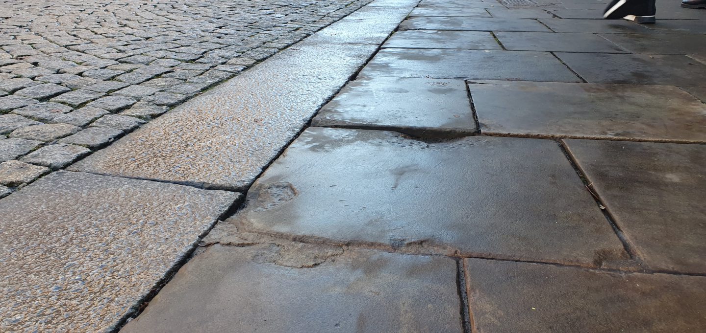 Broken stones on Elgin High Street. 