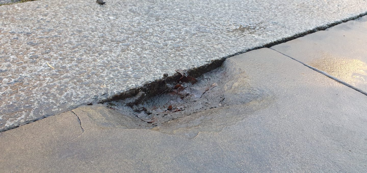 Broken stones on Elgin High Street. 