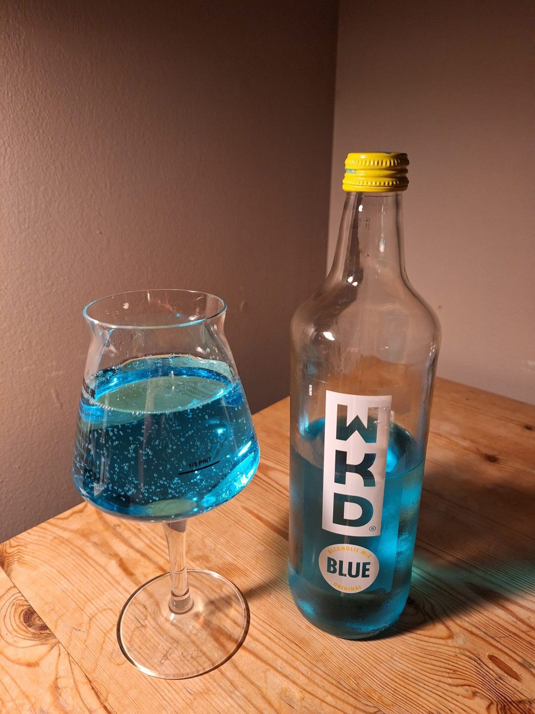 WKD Blue, poured out into a glass. 