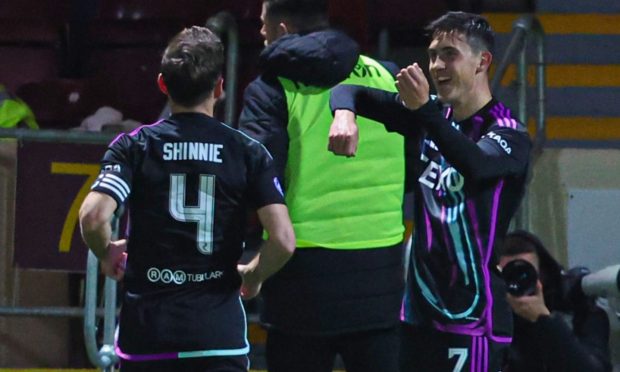 Aberdeen's Jamie McGrath (R) celebrates scoring to make it 1-0 against Motherwell. Image: SNS.