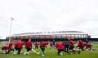Aberdeen training with Hampden in the background.  Image: SNS.