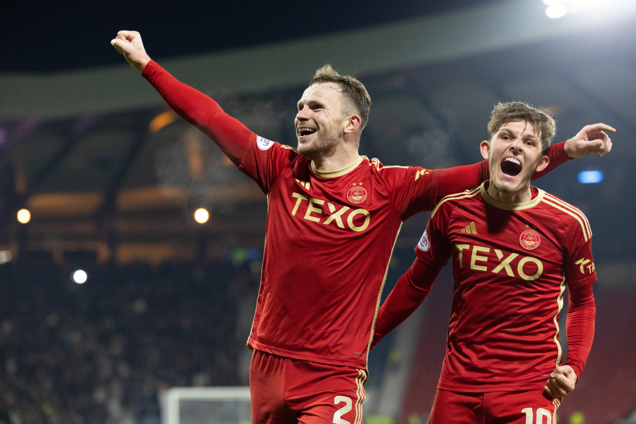 Aberdeen's Nicky Devlin and Leighton Clarkson celebrate during a Viaplay Cup semi-final match between Hibernian and Aberdeen at Hampden Park, on November 04, 2023, in Glasgow, Scotland. (Photo by Mark Scates / SNS Group)