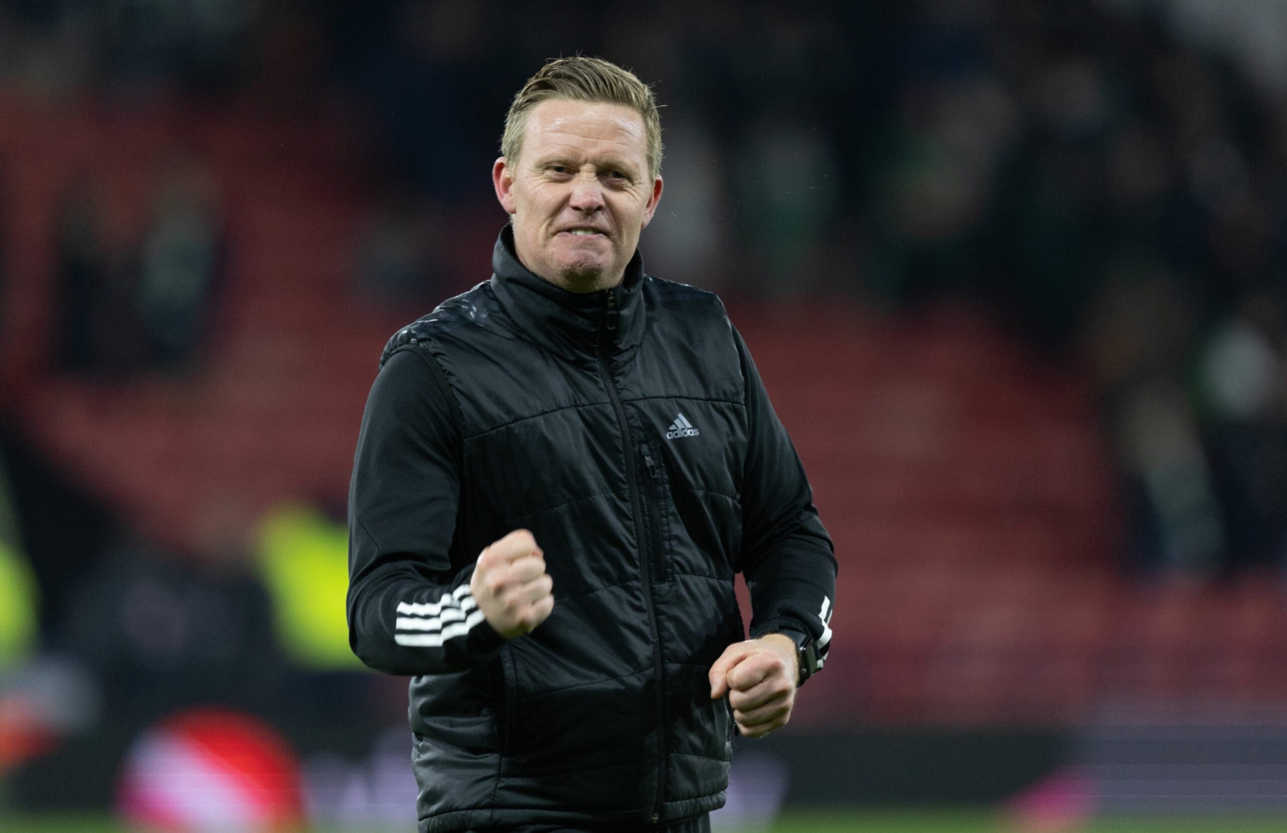 Aberdeen manager Barry Robson celebrating with his hands in fists