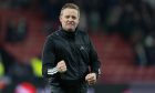 Aberdeen manager Barry Robson celebrates after reaching the Viaplay Cup final. Image: SNS.