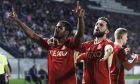 Aberdeen's Duk (L) celebrates with Graeme Shinnie after scoring to make it 1-0 against PAOK at Toumba Stadium. Image: Mark Scates/SNS.