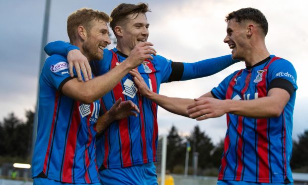 Inverness' David Wotherspoon celebrates scoring to make it 3-1 with teammates Morgan Boyes and Cameron Harper. Image: SNS.