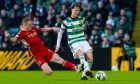 Aberdeen's Jonny Hayes tackles Celtic's Odin Thiago Holm. Image: SNS.