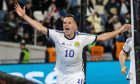 Scotland's Lawrence Shankland celebrates after scoring to make it 2-2 during the Uefa Euro 2024 qualifier in Georgia on Thursday. Image: SNS.