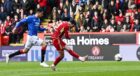 Aberdeen's Bojan Miovski scores to make it 1-0 against Rangers in the Premiership at Pittodrie. Image; SNS