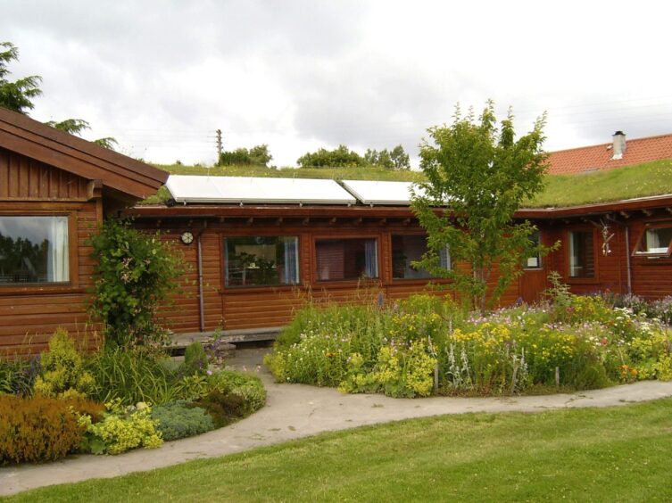 Turf and solar panels on the roof are delivering better energy efficiency for this lodge in Findhorn, Moray. 