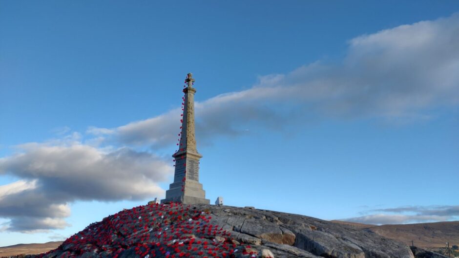 War memorial in Gorthleck covered in handmade poppies