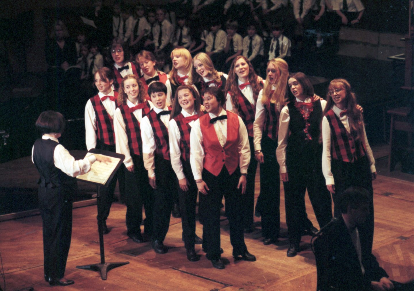 Conductor Joanne Burgess and Cults Academy Barber Shop Group on stage during the Evening Express Carol Concert at the Music Hall