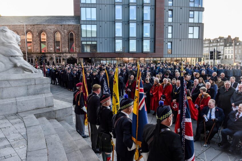 Many people gathered outside Cowdray Hall in Aberdeen on Remembrance Sunday 